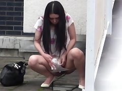 Pissing asians watched